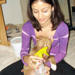 feeding dog indan girl