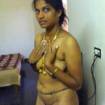 tamil aunty covering breasts