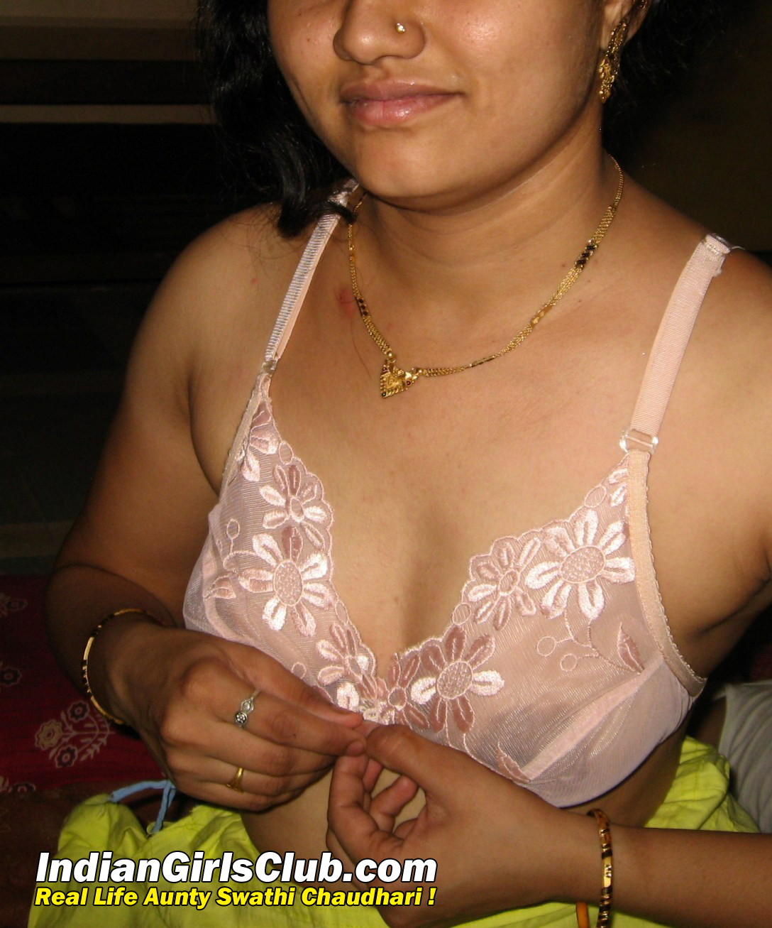 Indian aunty removing bra