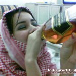 Arab Girl Drinking Bottle of Black Label Arab Girl Drinking Bottle of Black Label