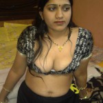 Homely Aunty Showing Deep Cleavage Homely Aunty Showing Deep Cleavage