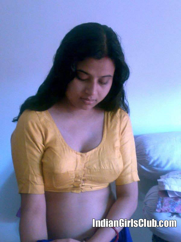 north indian aunty in yellow blouse and blue skirt