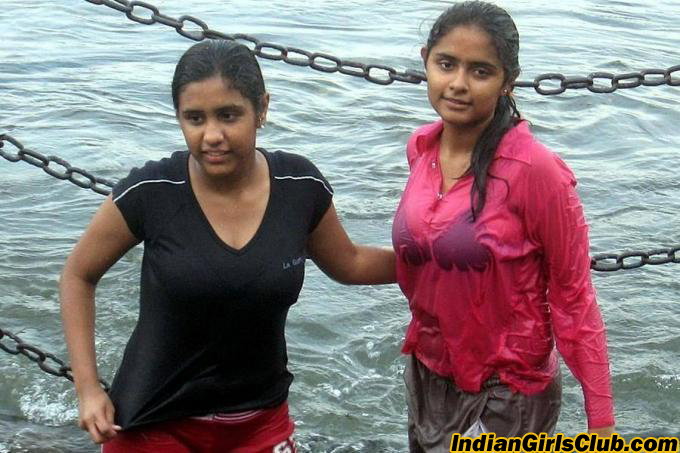 young indian girls bathing river